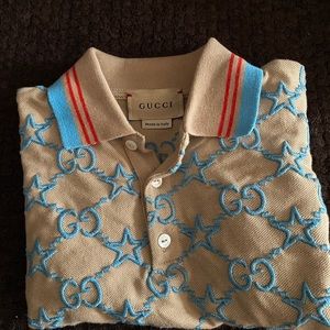 Tan Gucci shirt with blue G’s size 24month